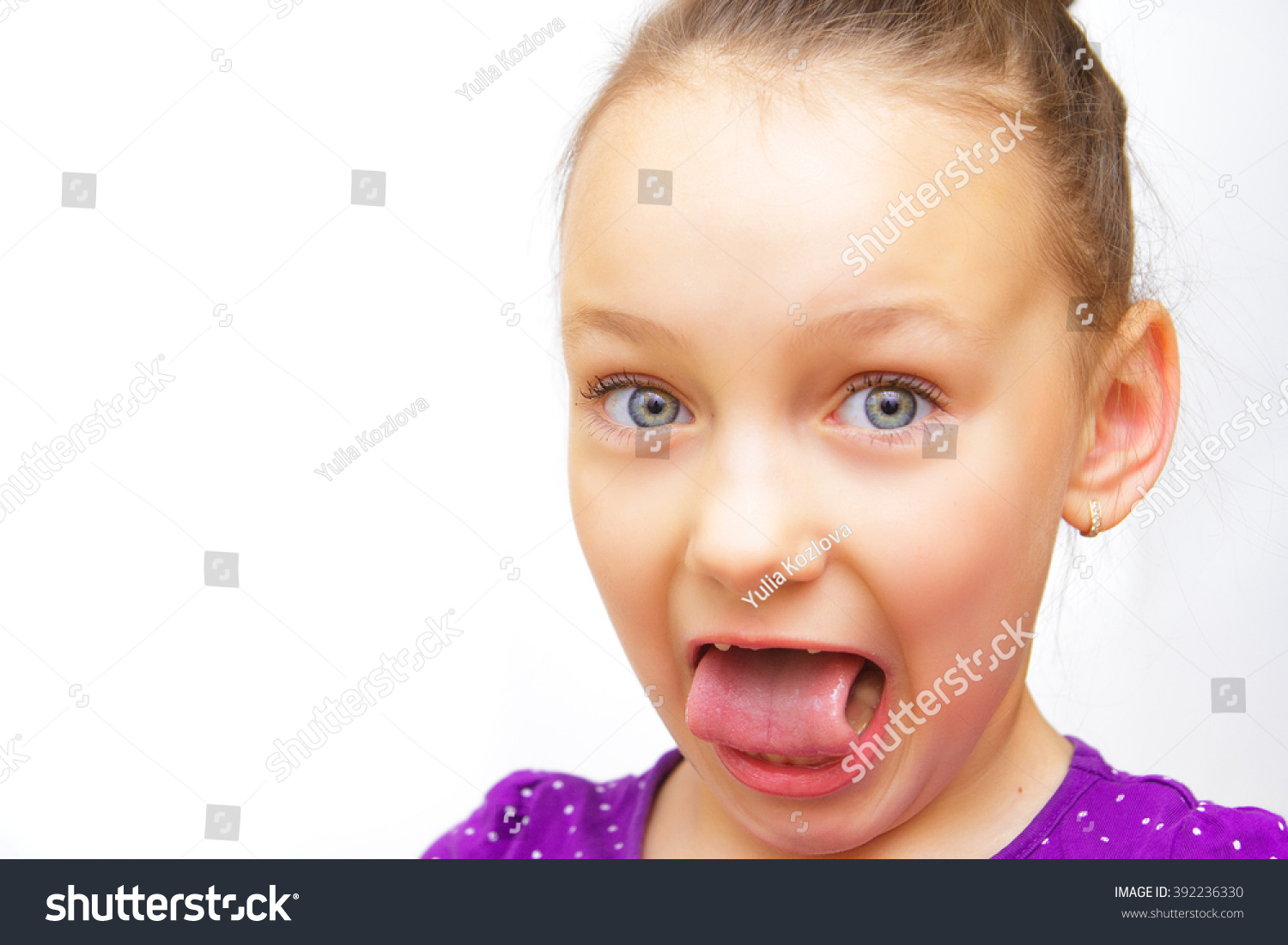 Girl Shows Tongue Grimaces Stock Photo 392236330 