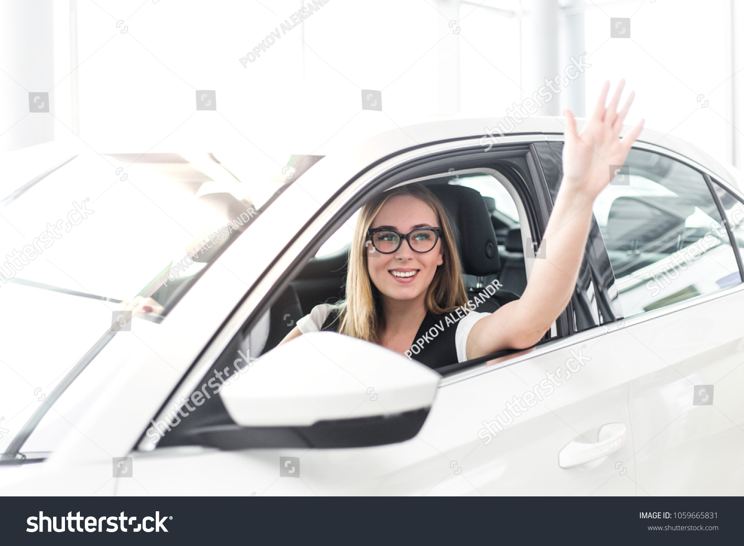 Girl Sitting Cabin New Car Waving Stock Photo Edit Now 1059665831