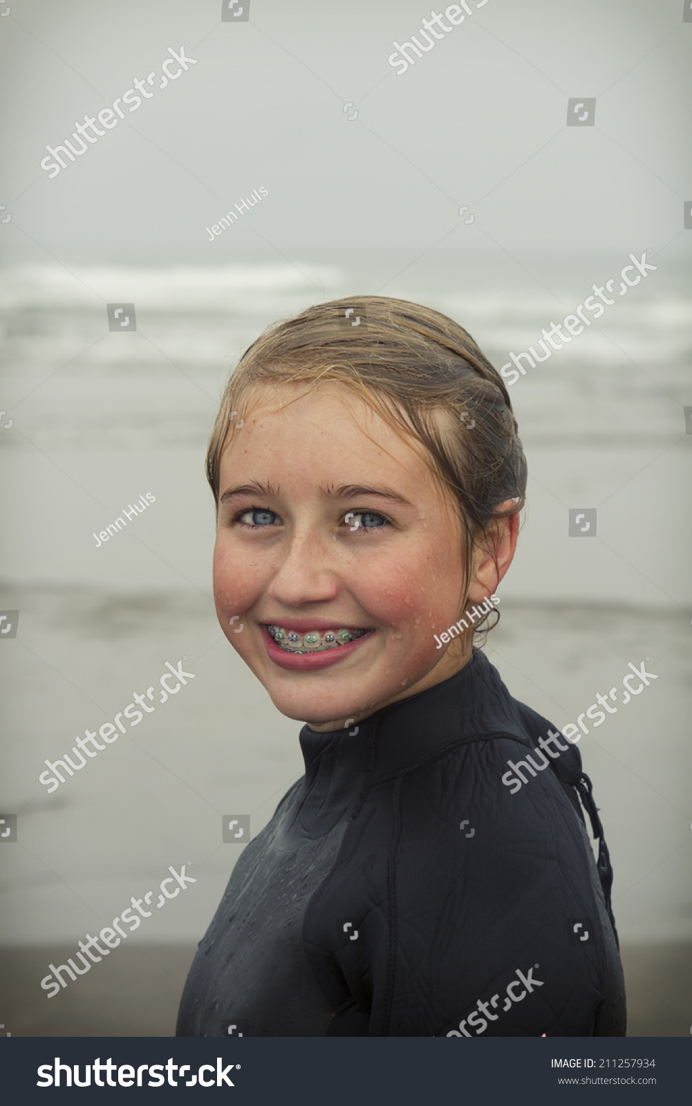 Girl Wearing Wet Suit Just Out Of Water Dripping Wet On Rockaway Beach ...