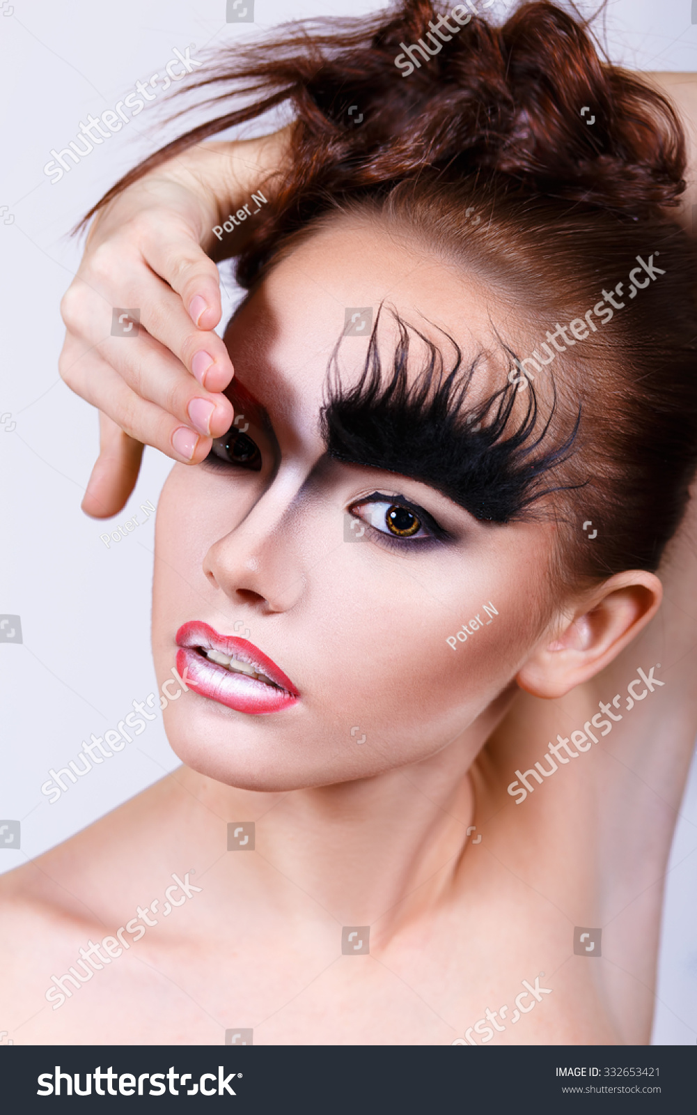 Girl With An Unusual Make-Up. Bushy Eyebrows. Makeup For Halloween ...