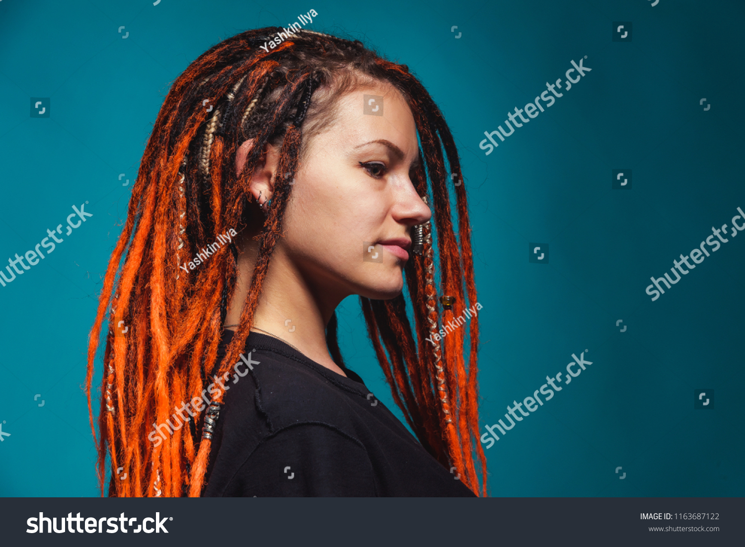 Girl Orange Dreadlocks On Turquoise Background Stock Photo Edit