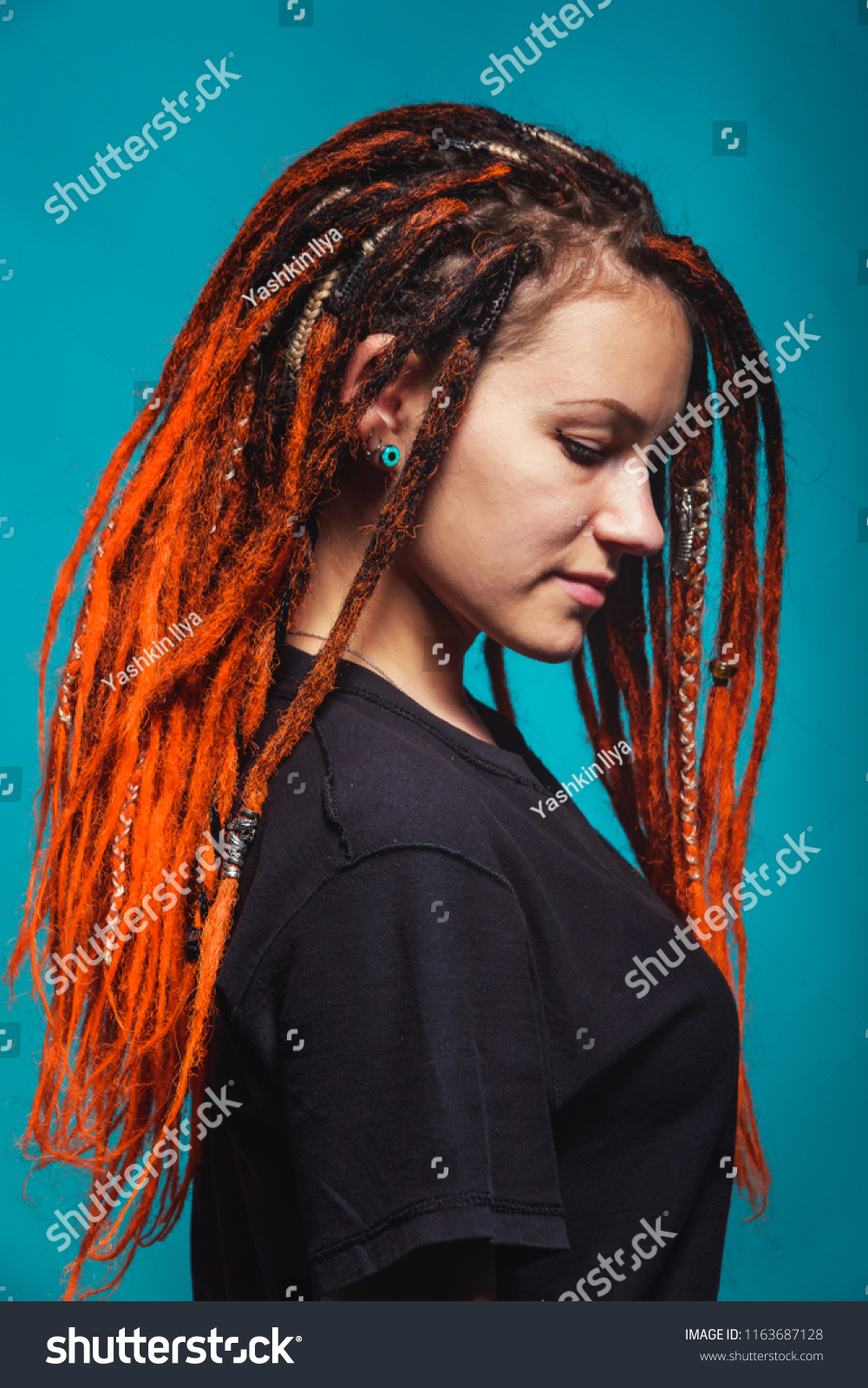 Girl Orange Dreadlocks On Turquoise Background Stock Photo Edit
