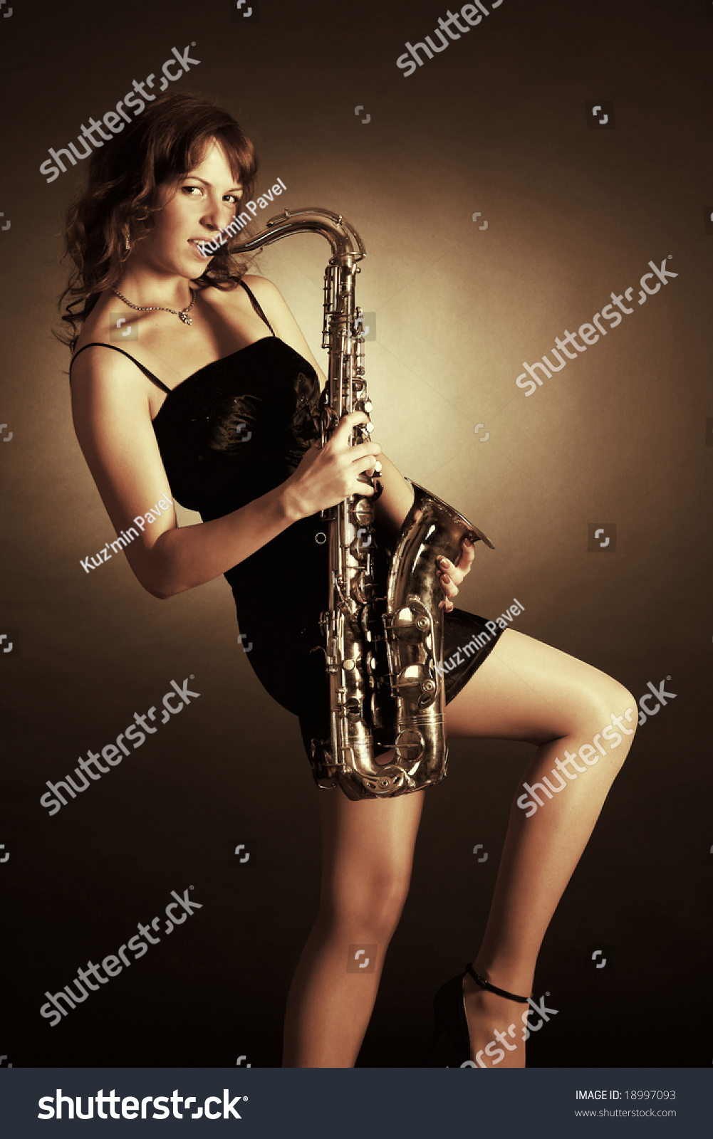 Girl With Saxophone Stock Photo 18997093 : Shutterstock