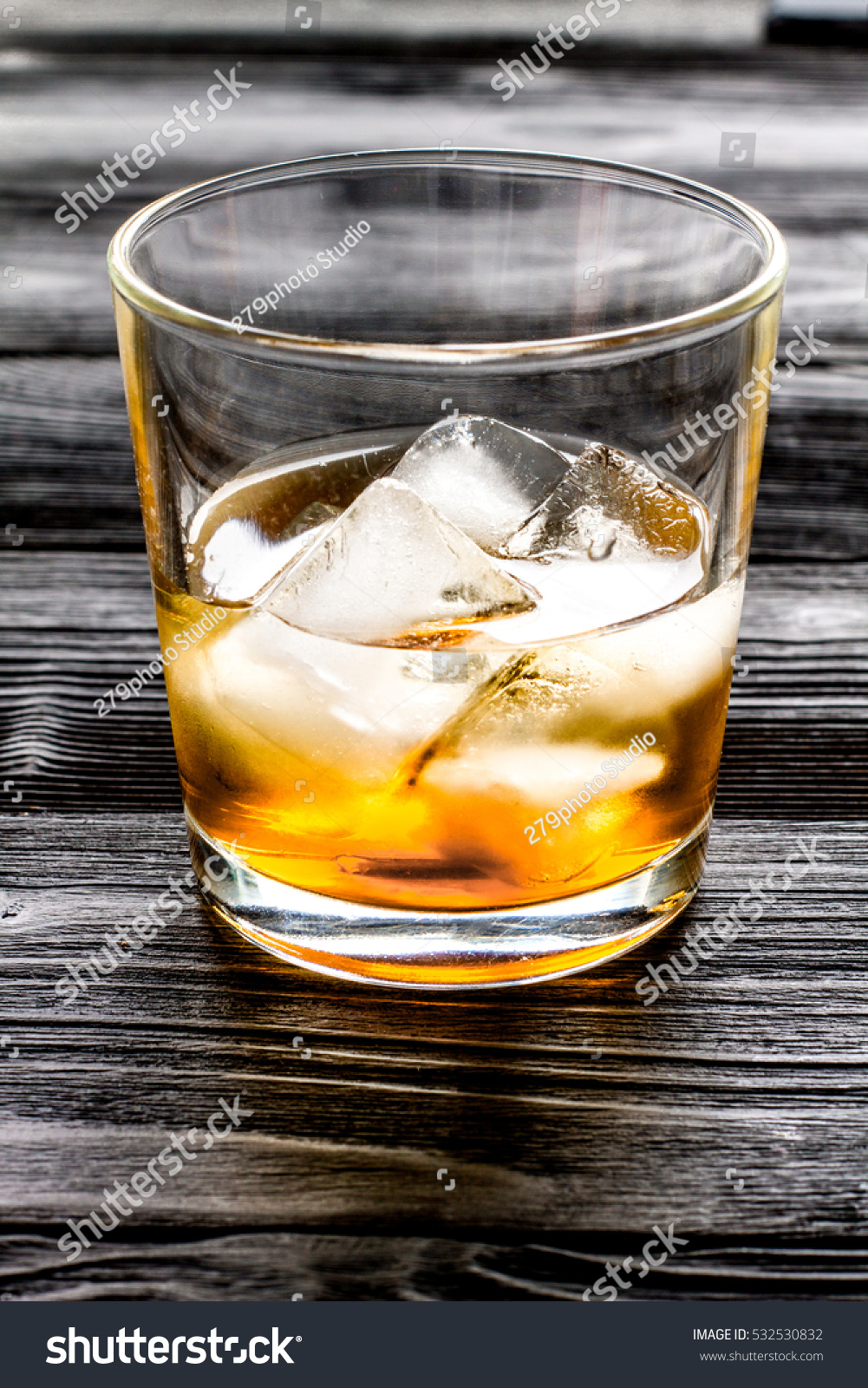 Glass Of Whiskey On Dark Wooden Background Stock Photo 532530832 ...