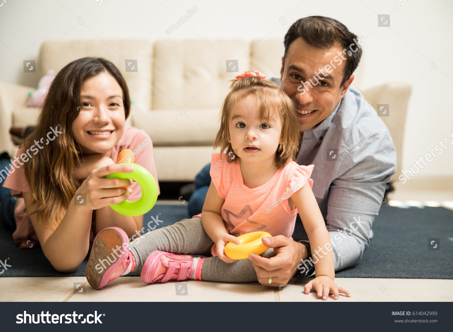 Gorgeous Family Playing Games Together Lying Stock Photo 614042999 ... Gorgeous Family Playing Games Together Lying Stock Photo 614042999 ...