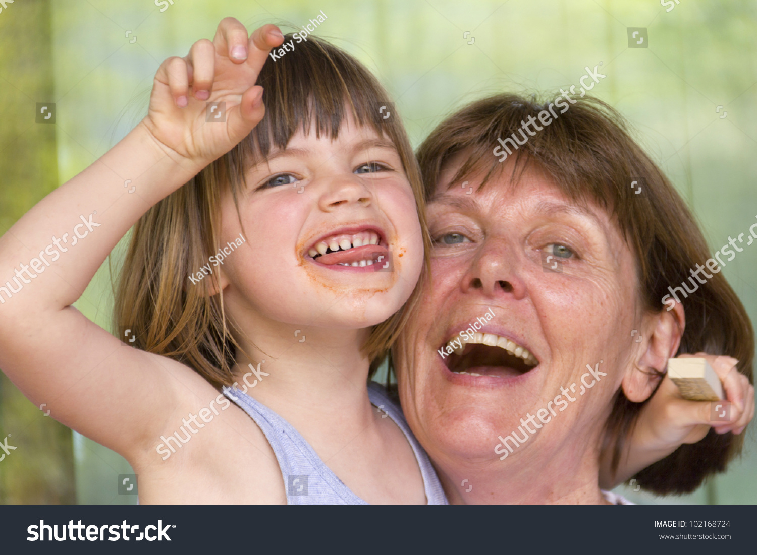 Grandma With Her Granddaughter Having Fun Stock Photo