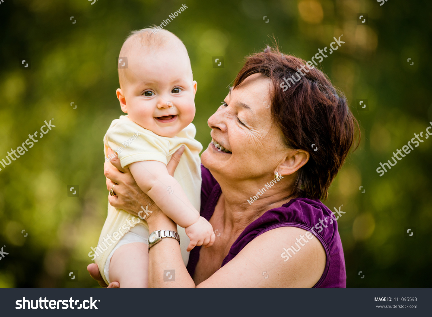 Grandmother With Grandchild - Senior Woman Holding Her Granddaughter ...