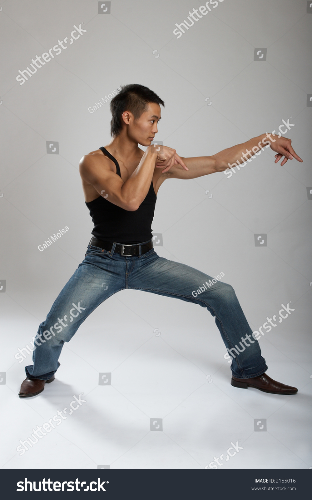 Great Looking Asian Guy Shot In Studio - Martial Arts Pose Stock Photo ...