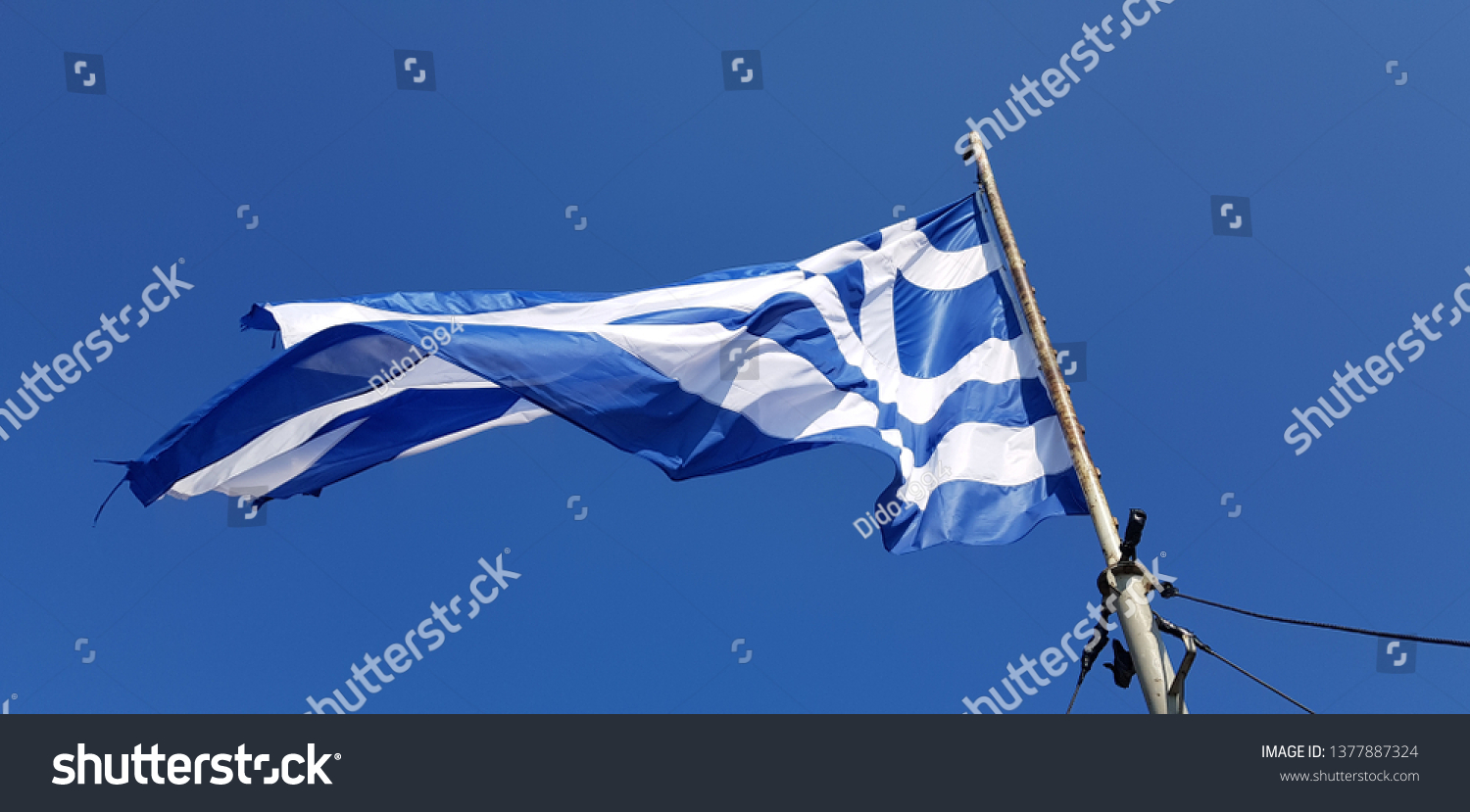 [Изображение: stock-photo-greek-flag-waving-against-cl...887324.jpg]