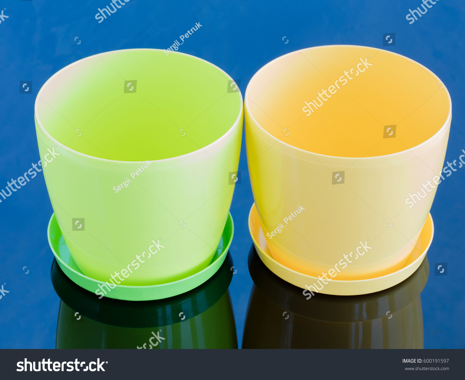 Download Green Yellow Empty Pot On Glossy Objects Stock Image 600191597 Yellowimages Mockups