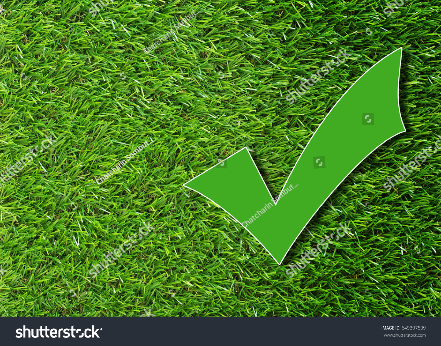 green-check-mark-on-grass-background-stock-photo-edit-now-649397509