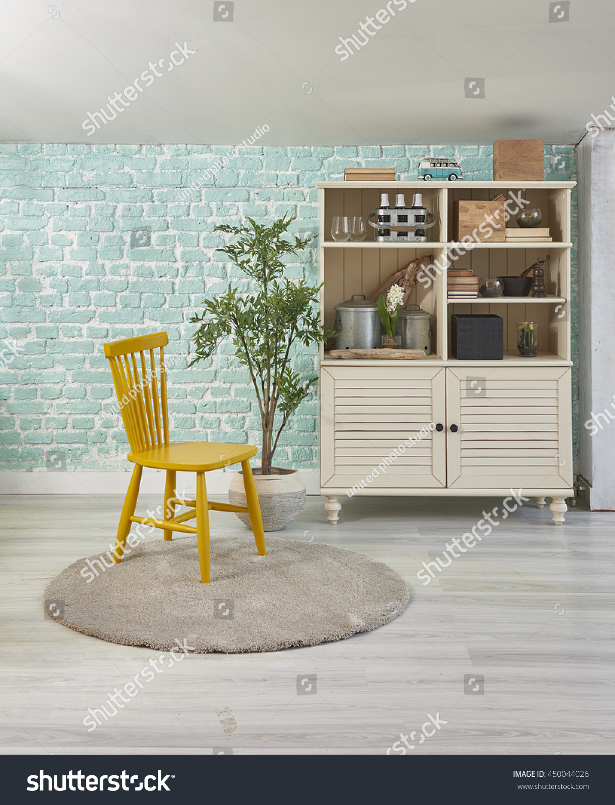 Green Mint Wall Yellow Chair Sideboard Royalty Free Stock