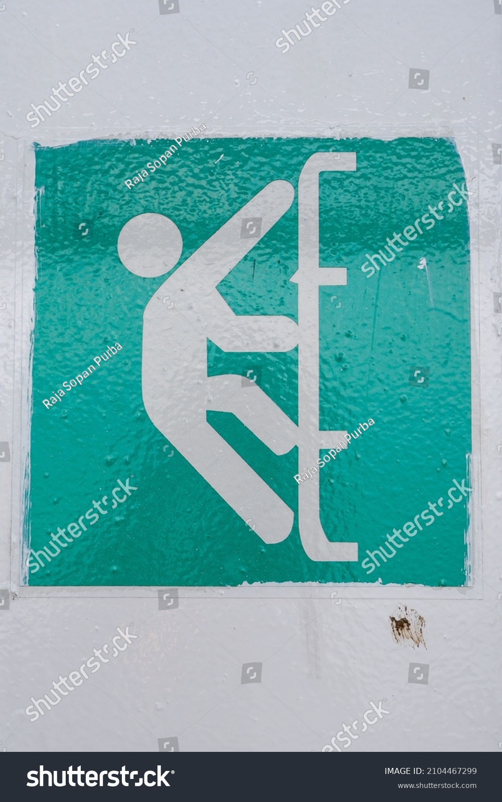 green-sign-on-wall-go-stairs-stock-photo-2104467299-shutterstock