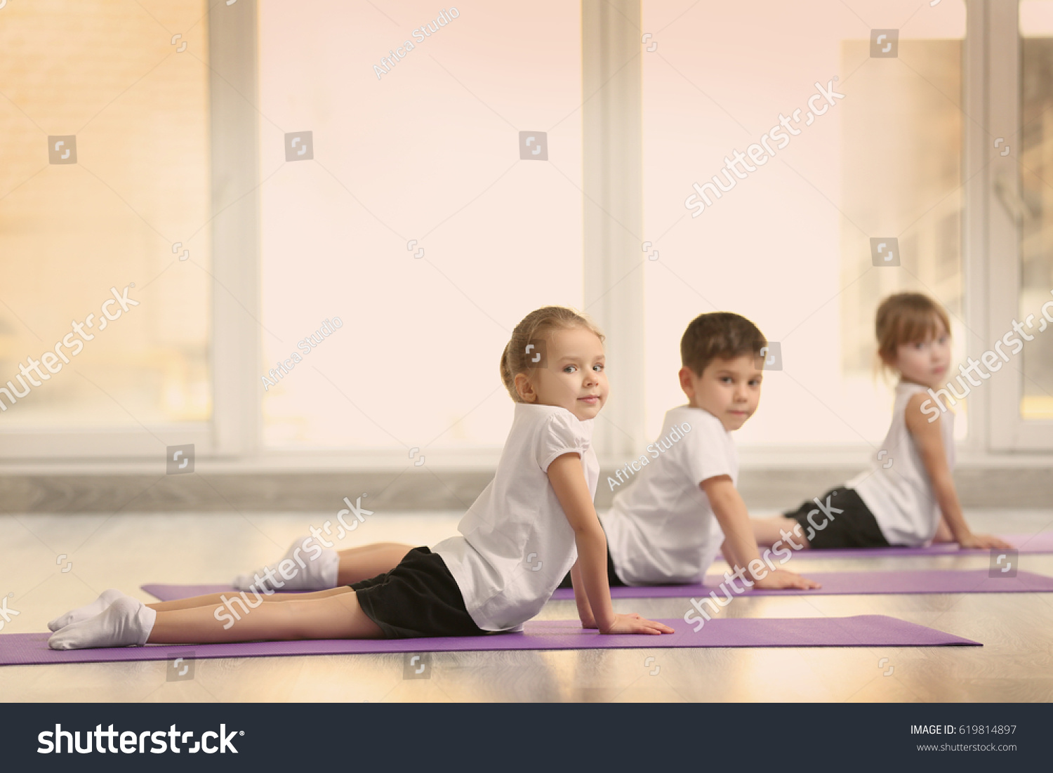 Group Children Doing Gymnastic Exercises Stock Photo Edit Now 619814897