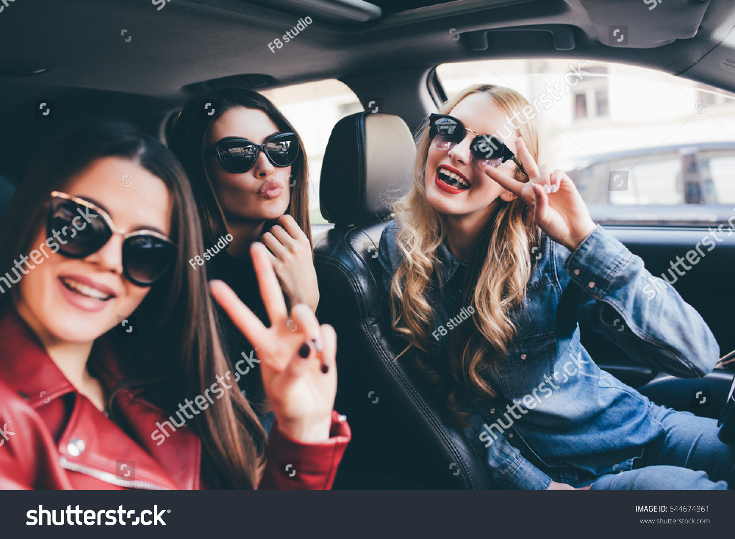 Group Friends Having Fun On Car Stock Photo (Edit Now) 644674861