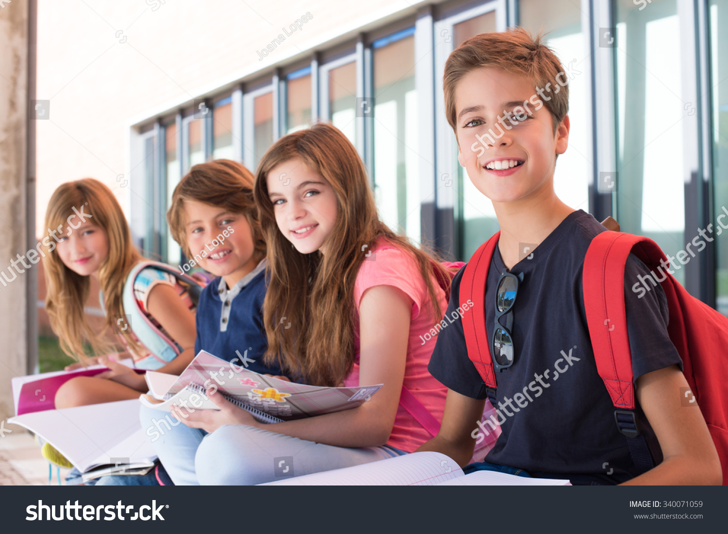 Group Of Happy Little School Kids In School Stock Photo 340071059 ...