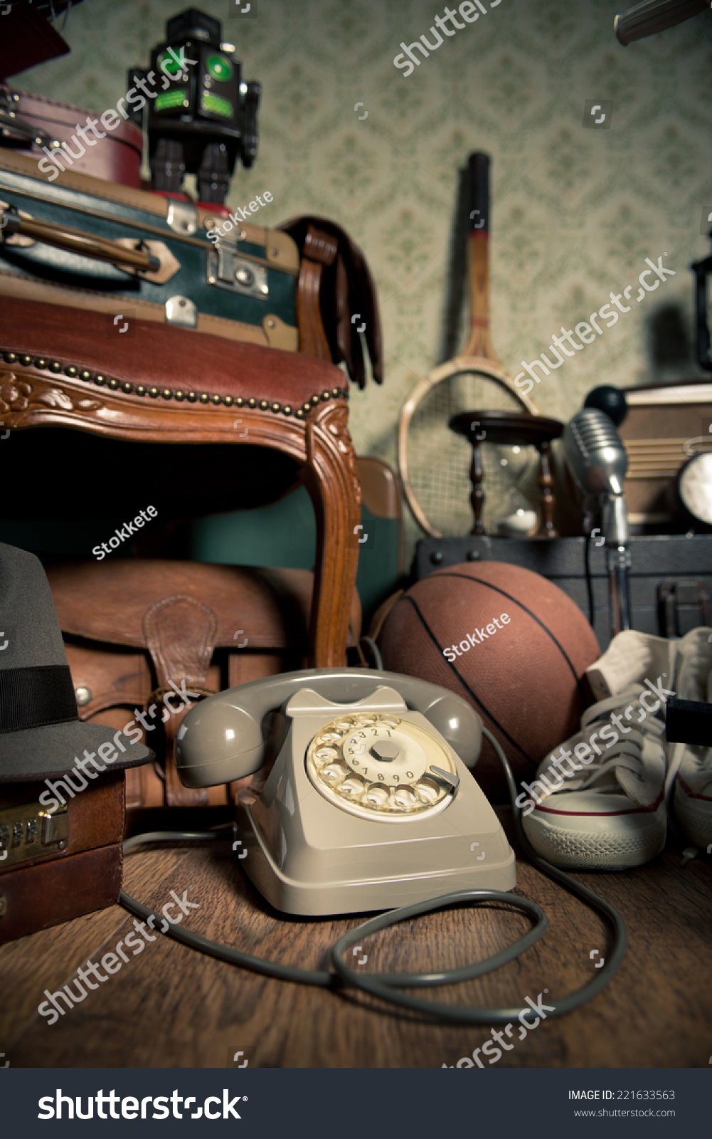 Group Of Vintage Objects On Attic Hardwood Floor Including Old Toys Phone And Sports Group Of Vintage Objects On Attic Hardwood Floor Including Old Toys Phone And Sports