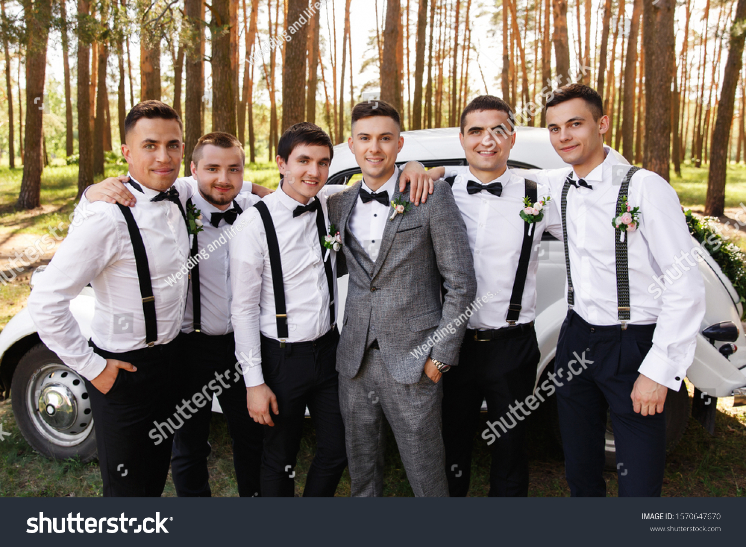 groom tux and groomsmen