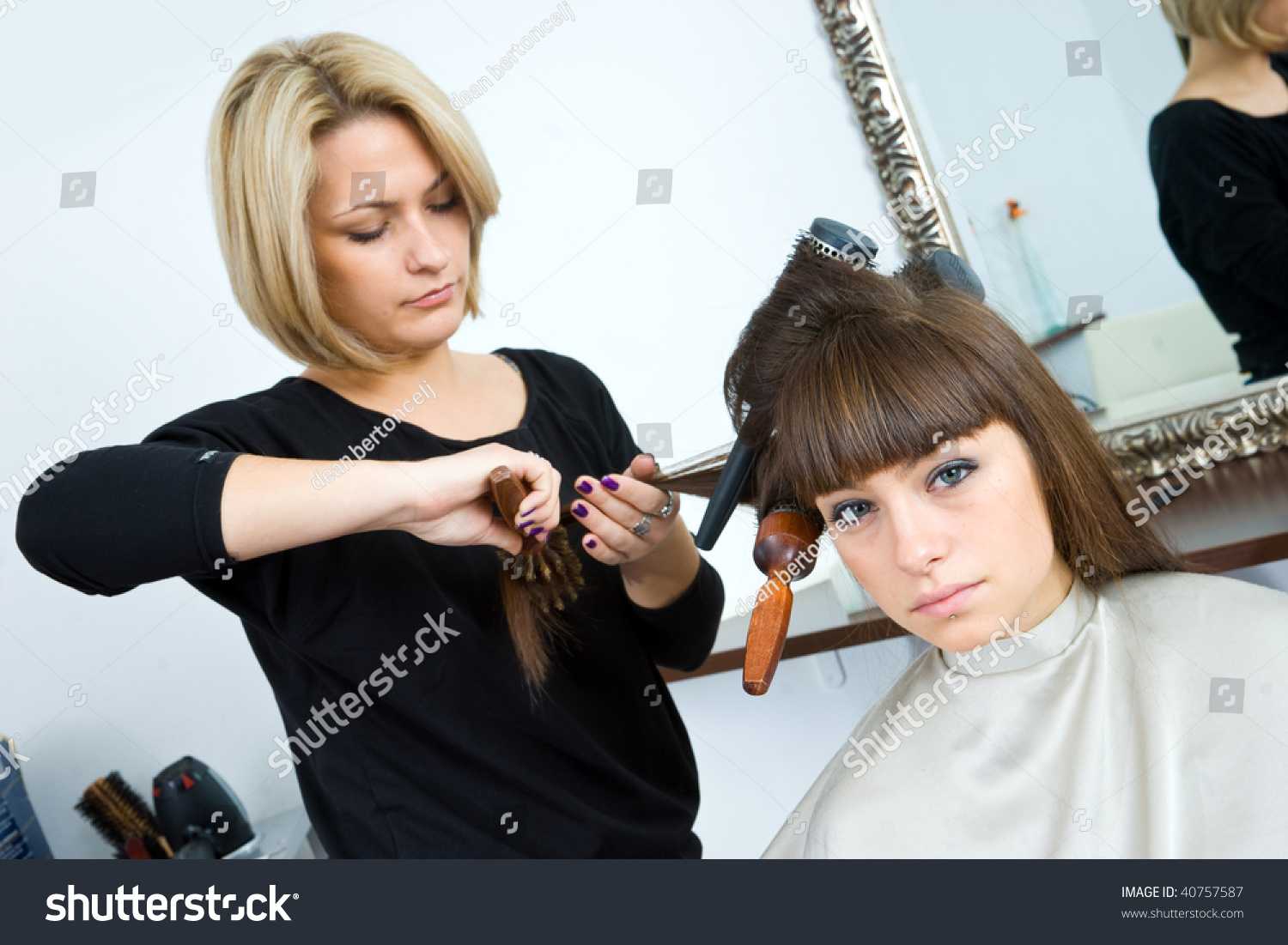 Hair Stylist Woman Brushes Her Hair Stock Photo Edit Now 40757587