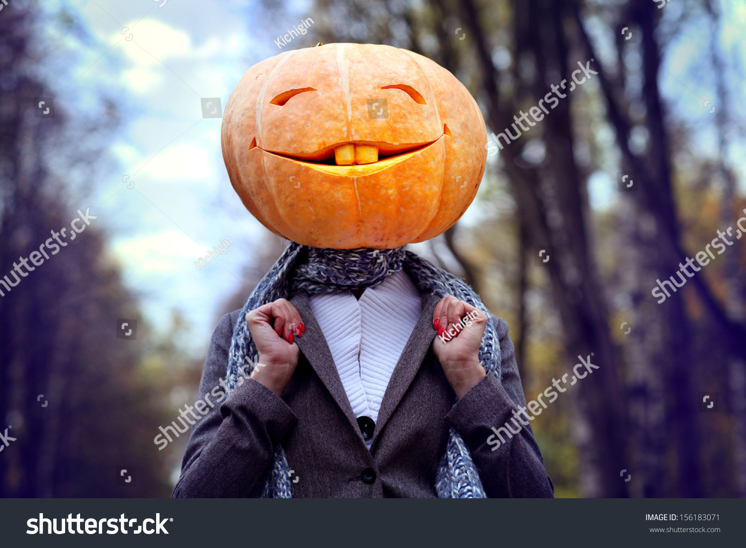 stock-photo-halloween-pumpkin-head-girl-156183071.jpg