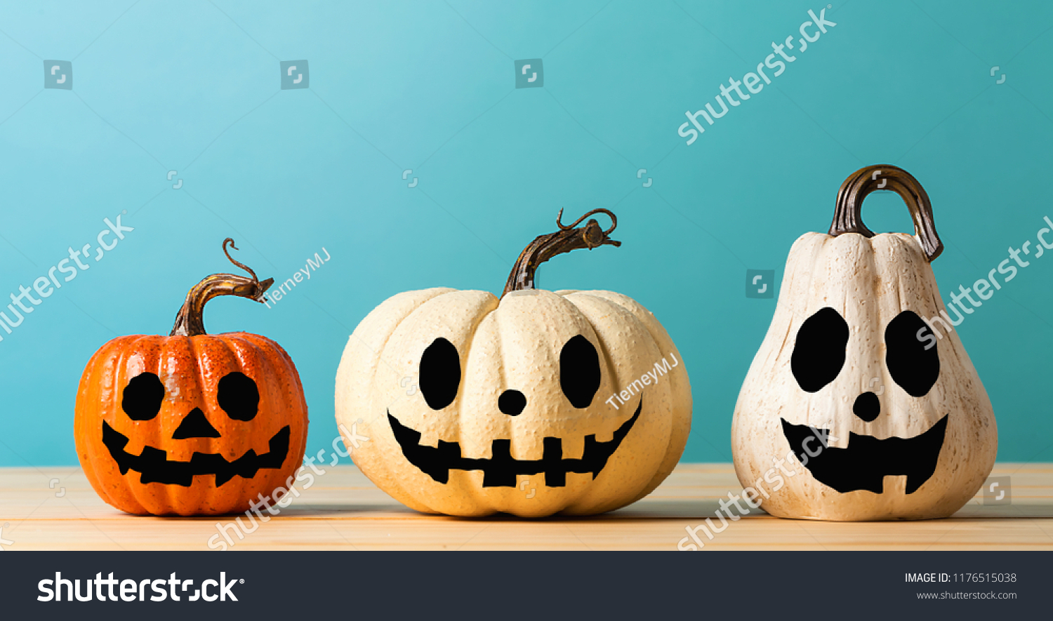 Halloween Pumpkins On Table On Blue Stock Photo 1176515038 | Shutterstock