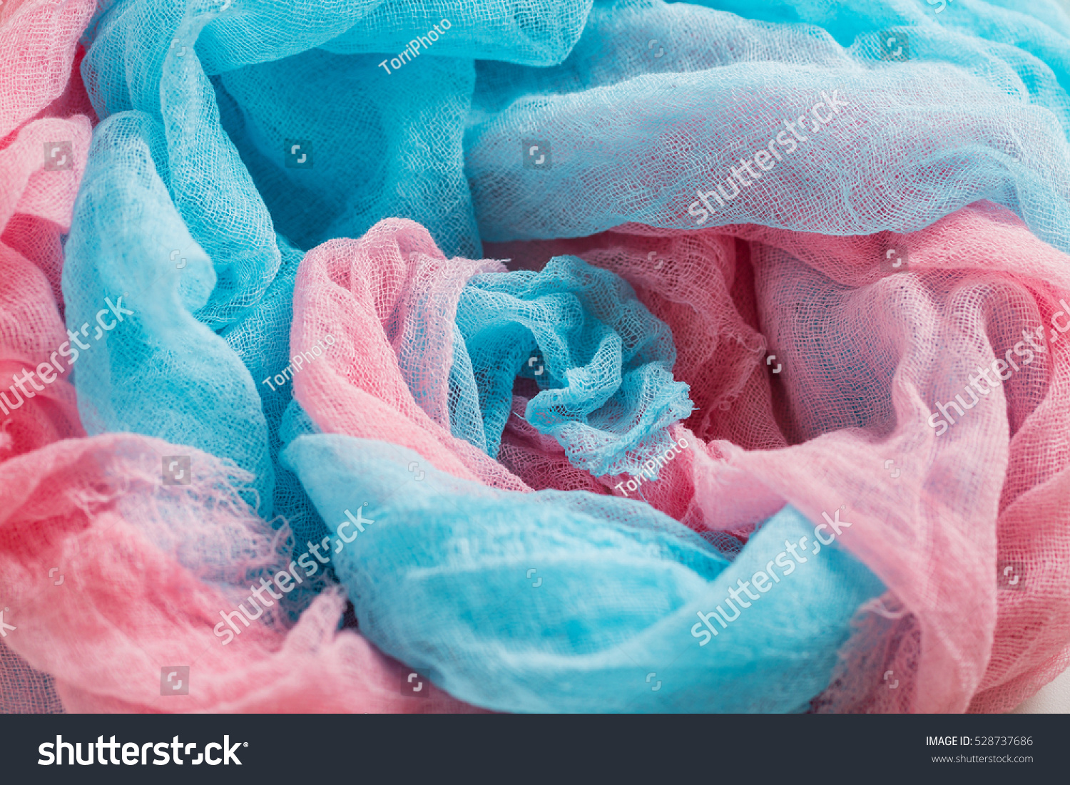 https://www.shutterstock.com/pic-528737686/stock-photo-hand-dyed-blue-and-pink-gauze-fabric-colorful-cloth-texture-background.html