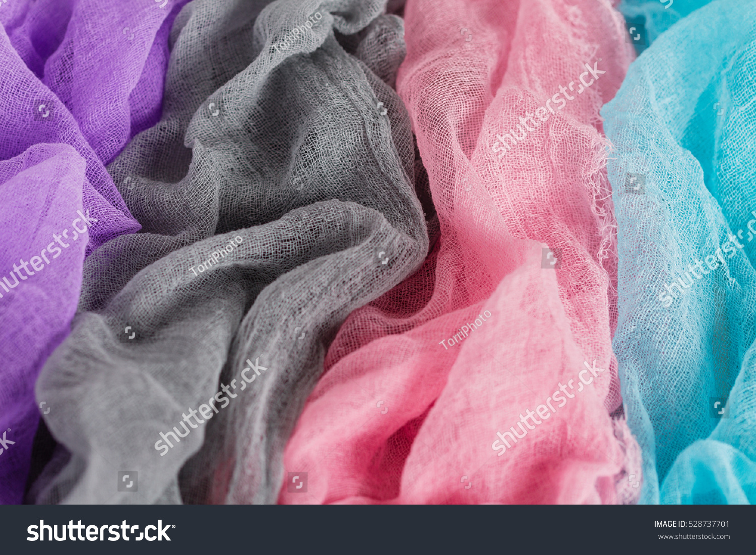https://www.shutterstock.com/pic-528737701/stock-photo-hand-dyed-gauze-fabric-colorful-cloth-texture-background.html