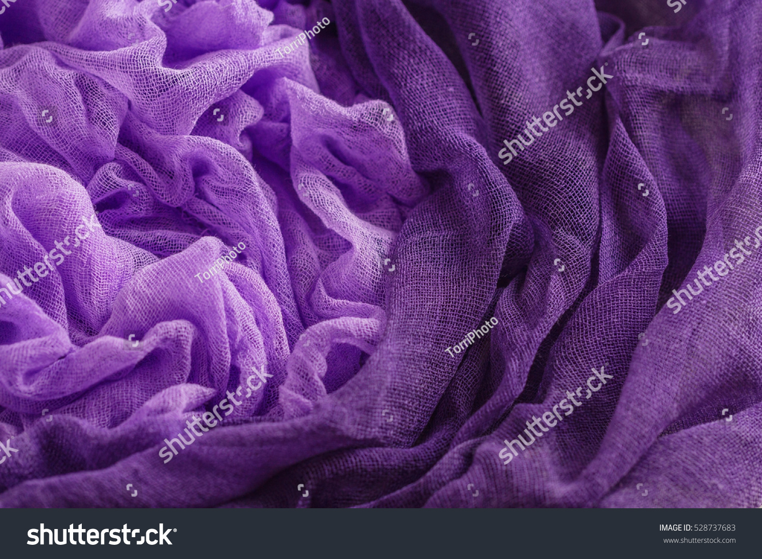 https://www.shutterstock.com/pic-528737683/stock-photo-hand-dyed-gauze-fabric-purple-color-colorful-cloth-texture-background.html