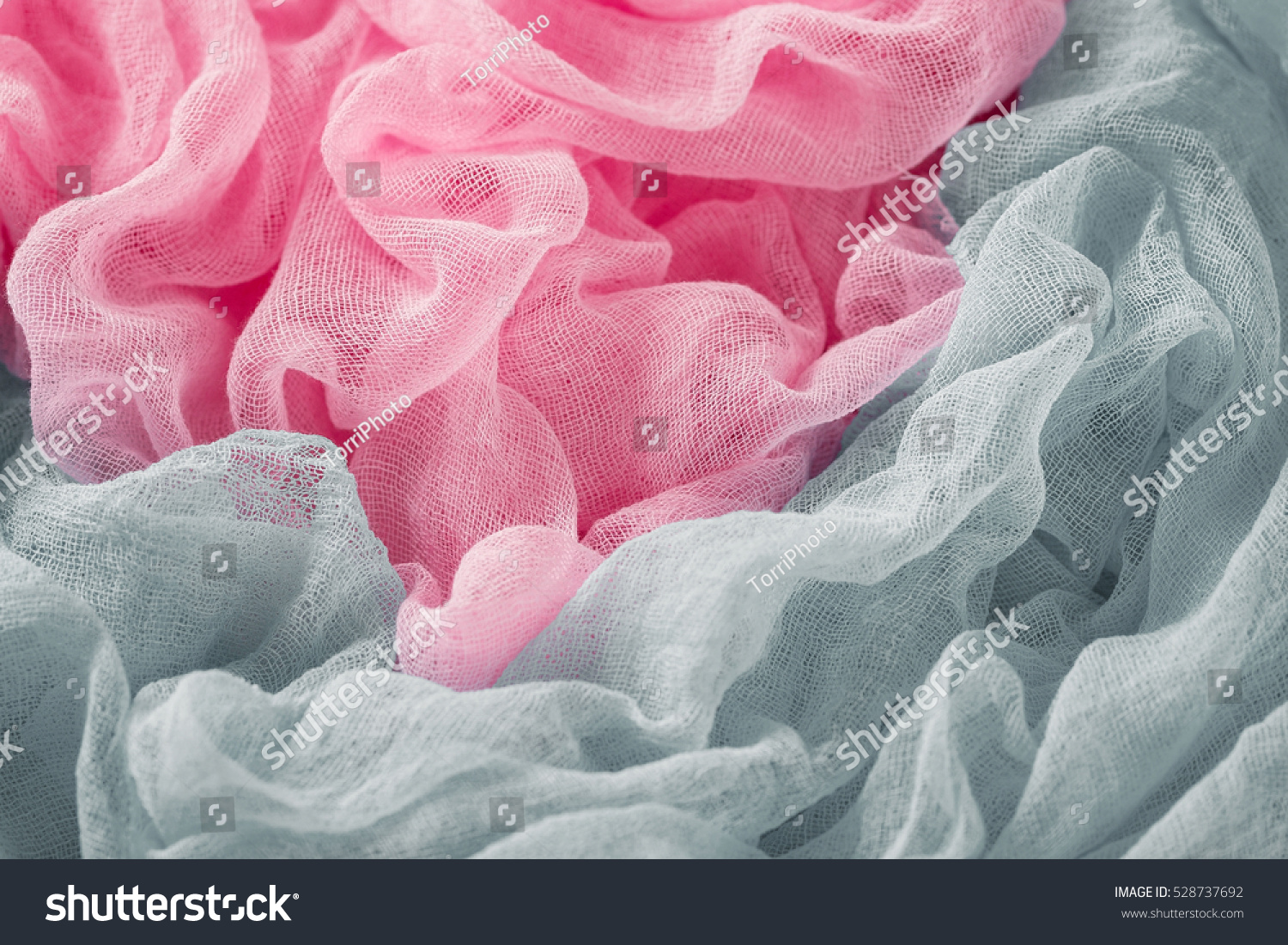https://www.shutterstock.com/pic-528737692/stock-photo-hand-dyed-pastel-colored-gauze-fabric-in-gray-and-pink-colorful-cloth-texture-background.html