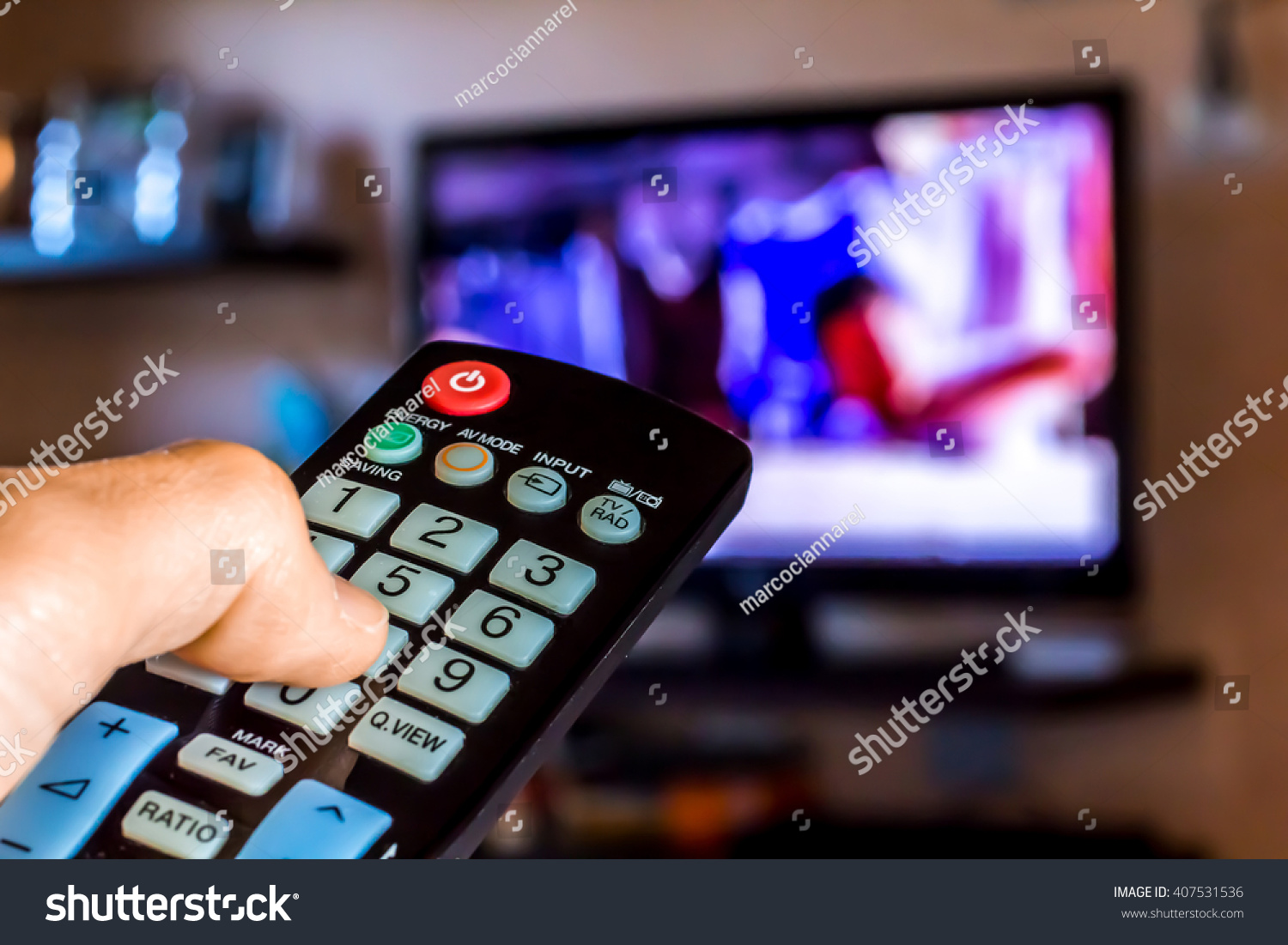 Hand Hold Remote Control Change Channels Stock Photo (Edit Now) 407531536