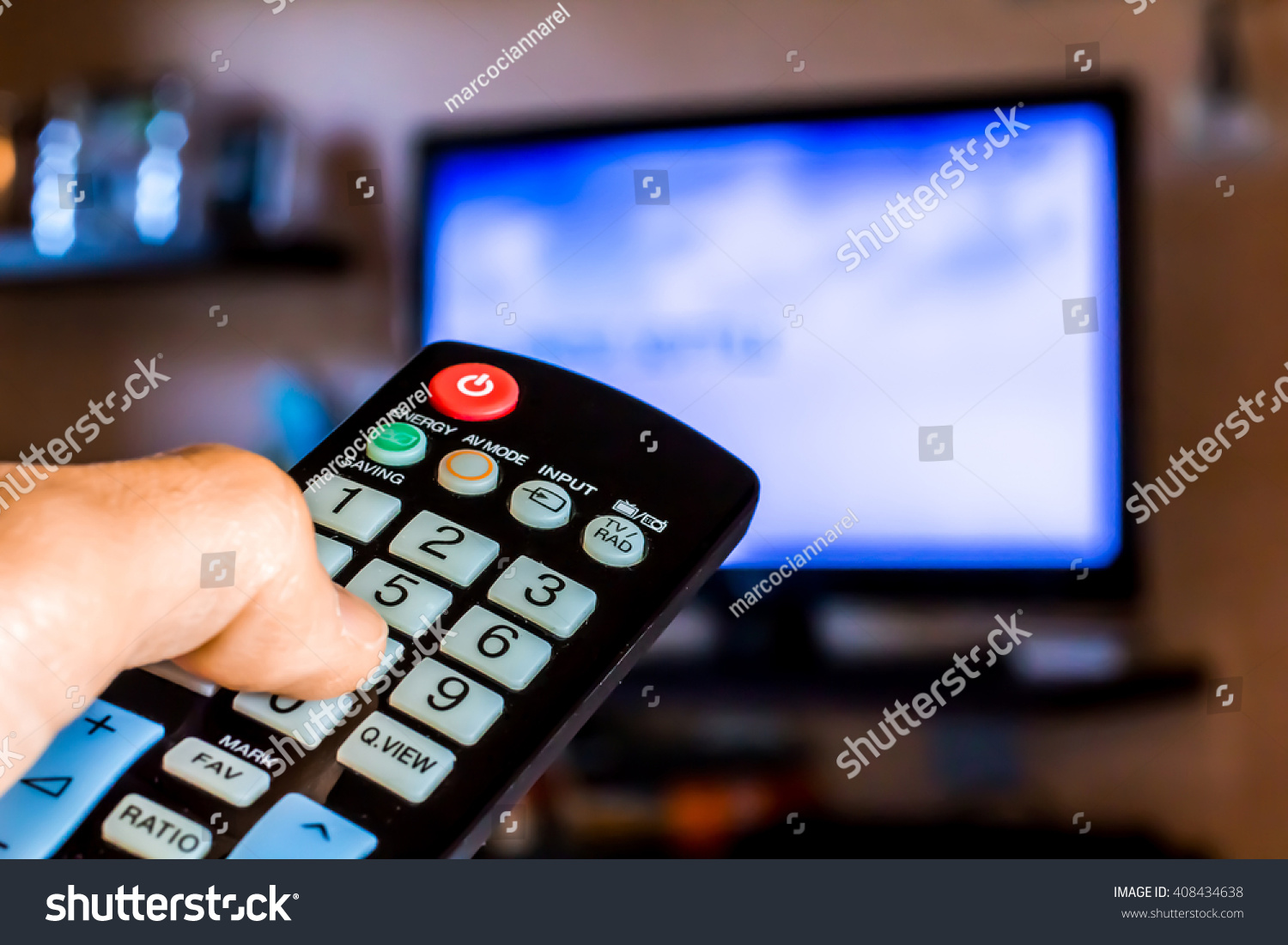 Hand Hold Remote Control Change Channels Stock Photo (Edit Now) 408434638