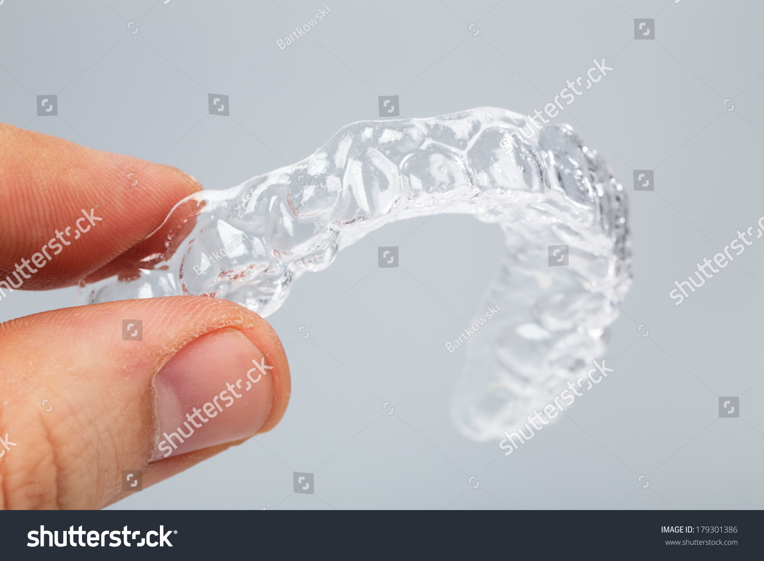 Hand Holding Translucent Upper Essix Retainer Stock Photo (Edit Now ...