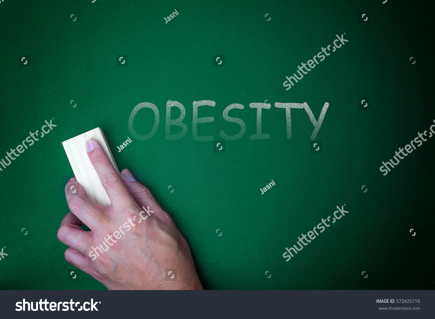 Hand Holding Eraser On Text Obesity Stock Photo 573425710 | Shutterstock