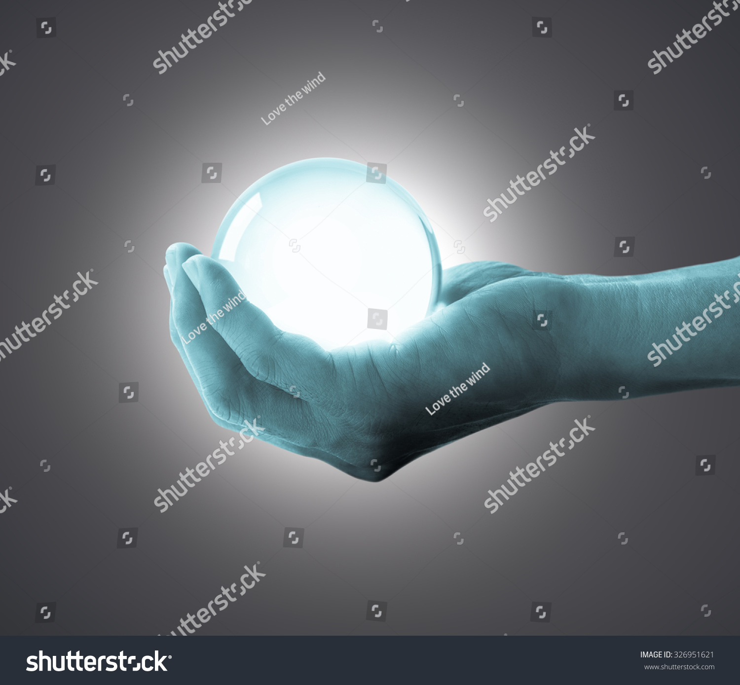 Hand Holding Glass Ball Stock Photo 326951621 