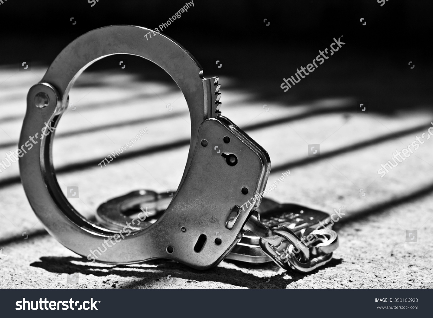 Handcuff Stock Photo 350106920 : Shutterstock