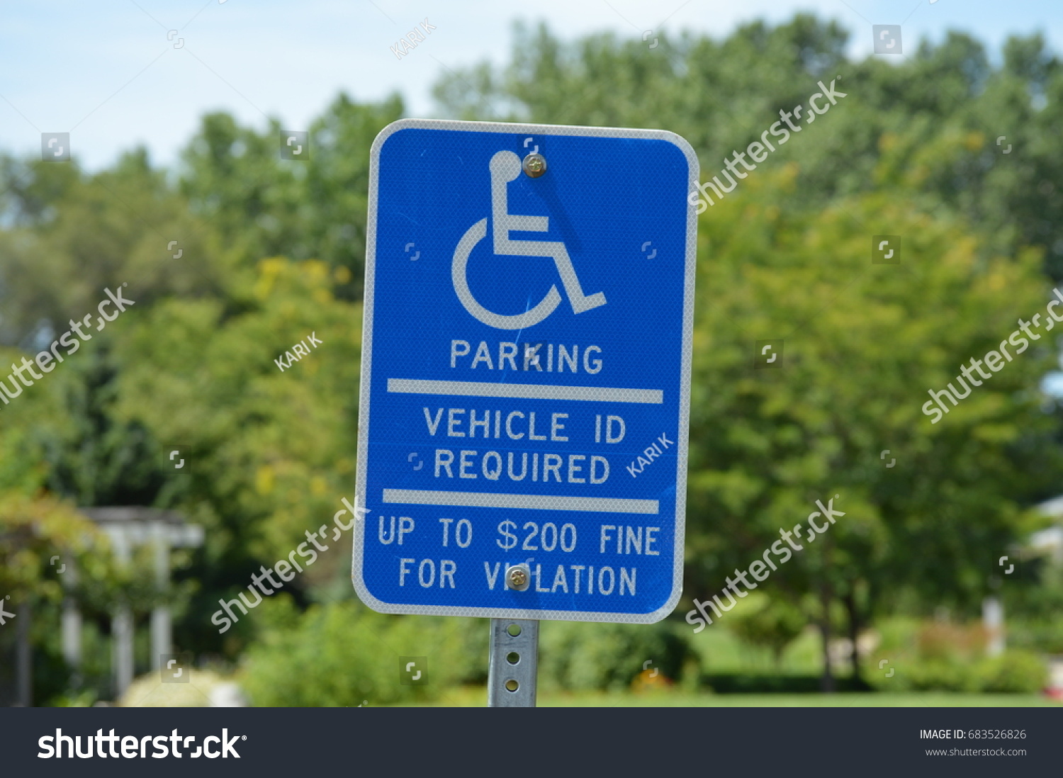 handicap-parking-sign-stock-photo-683526826-shutterstock