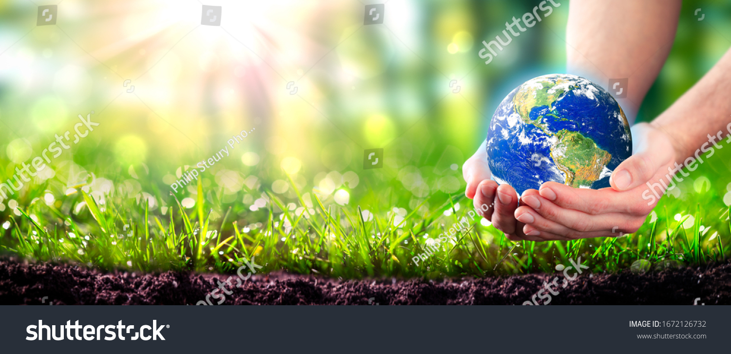 Hands Holding Planet Earth Lush Green Stock Photo (Edit Now) 1672126732