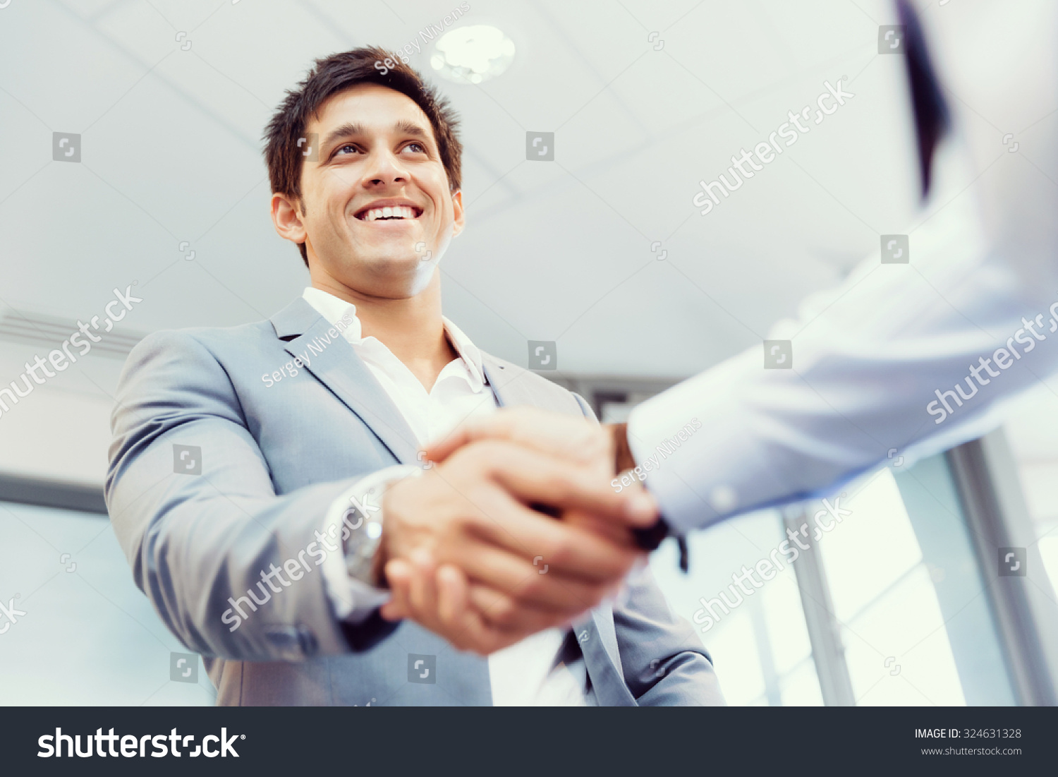 Handshake Of Businessmen Greeting Each Other Stock Photo 324631328 ...