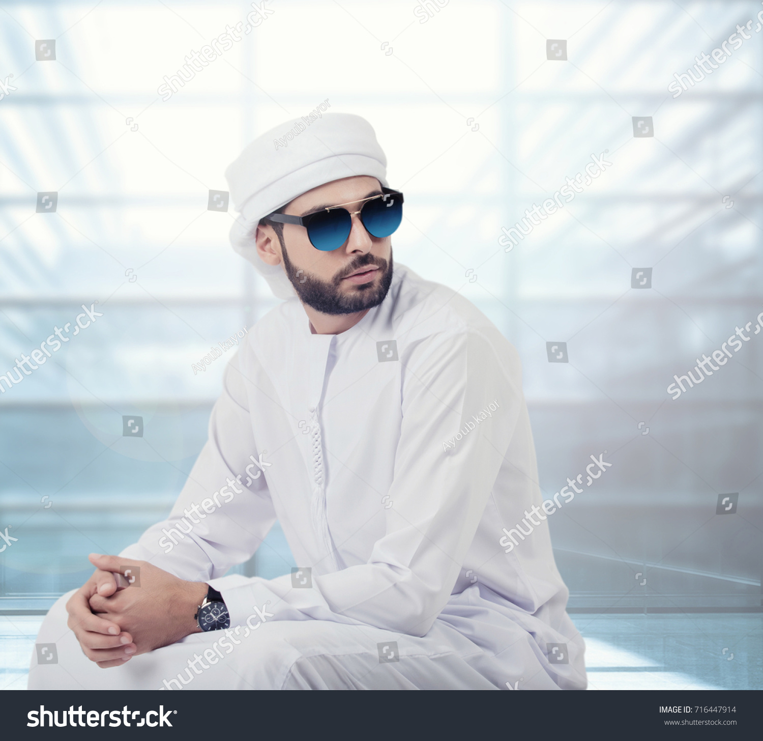 Handsome Arabic Man Posing Kandura Sunglasses Stock Photo Edit Now 716447914