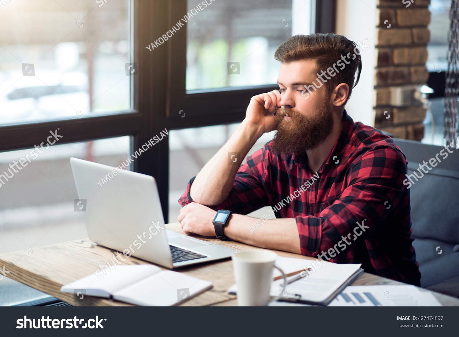 Handsome Bearded Man Sitting At The Table Stock Photo 427474897 ...