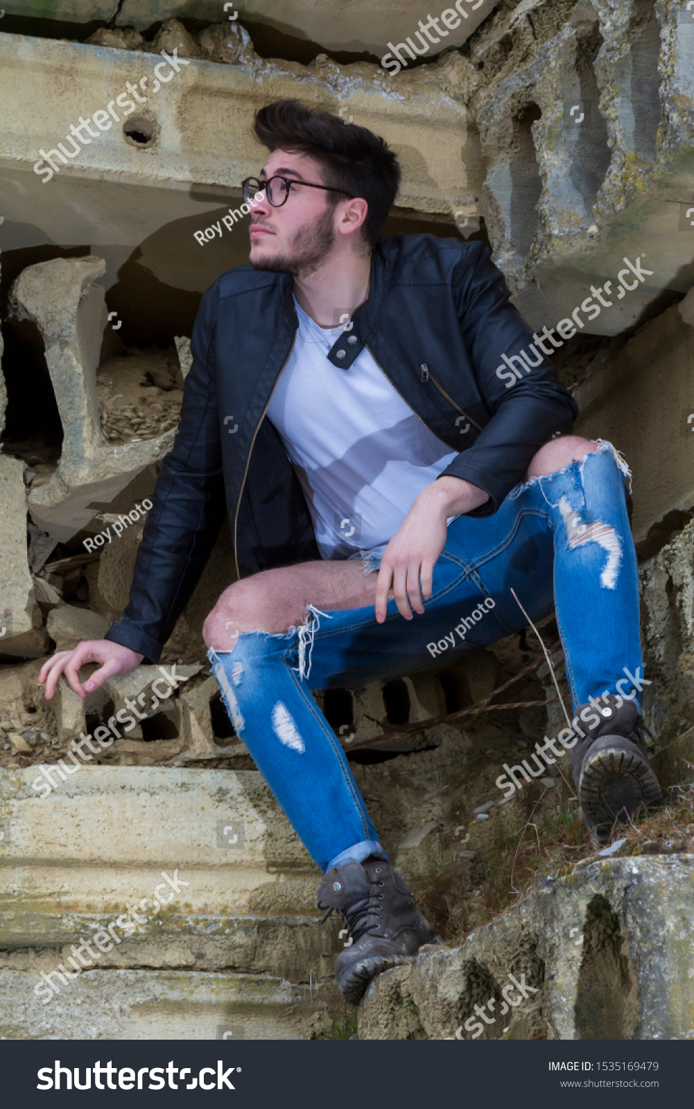 guy with ripped jeans