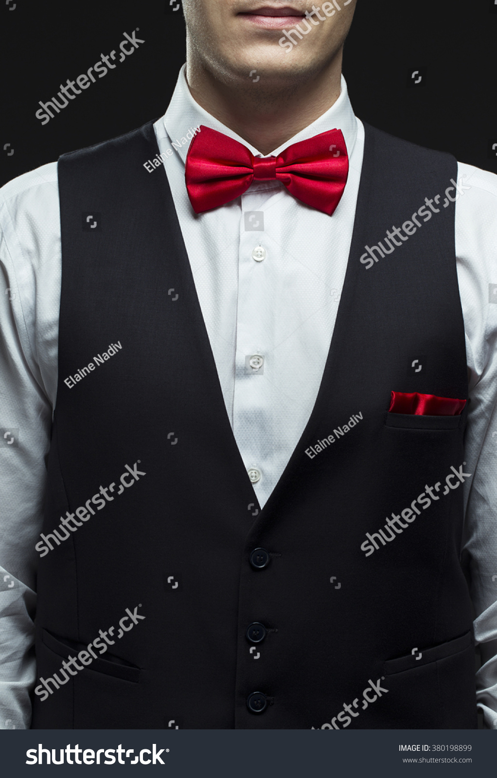 black dress shirt with red bow tie