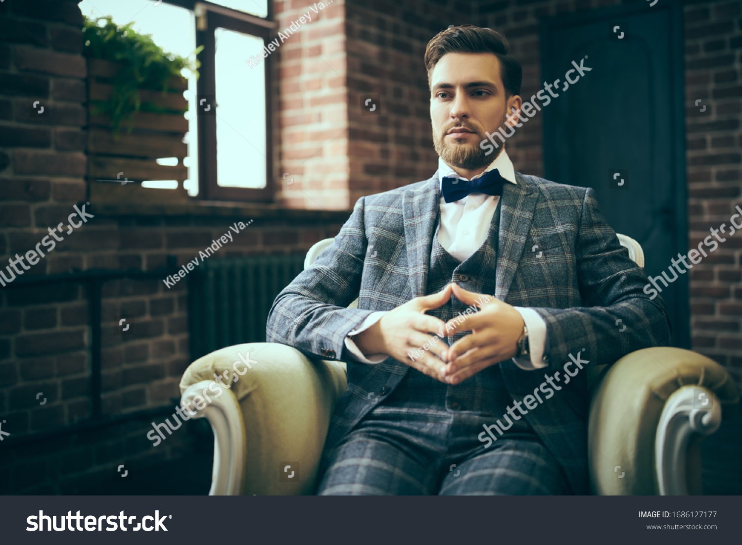 Handsome Gentleman Sitting Relaxed On Vintage Stock Photo 1686127177 