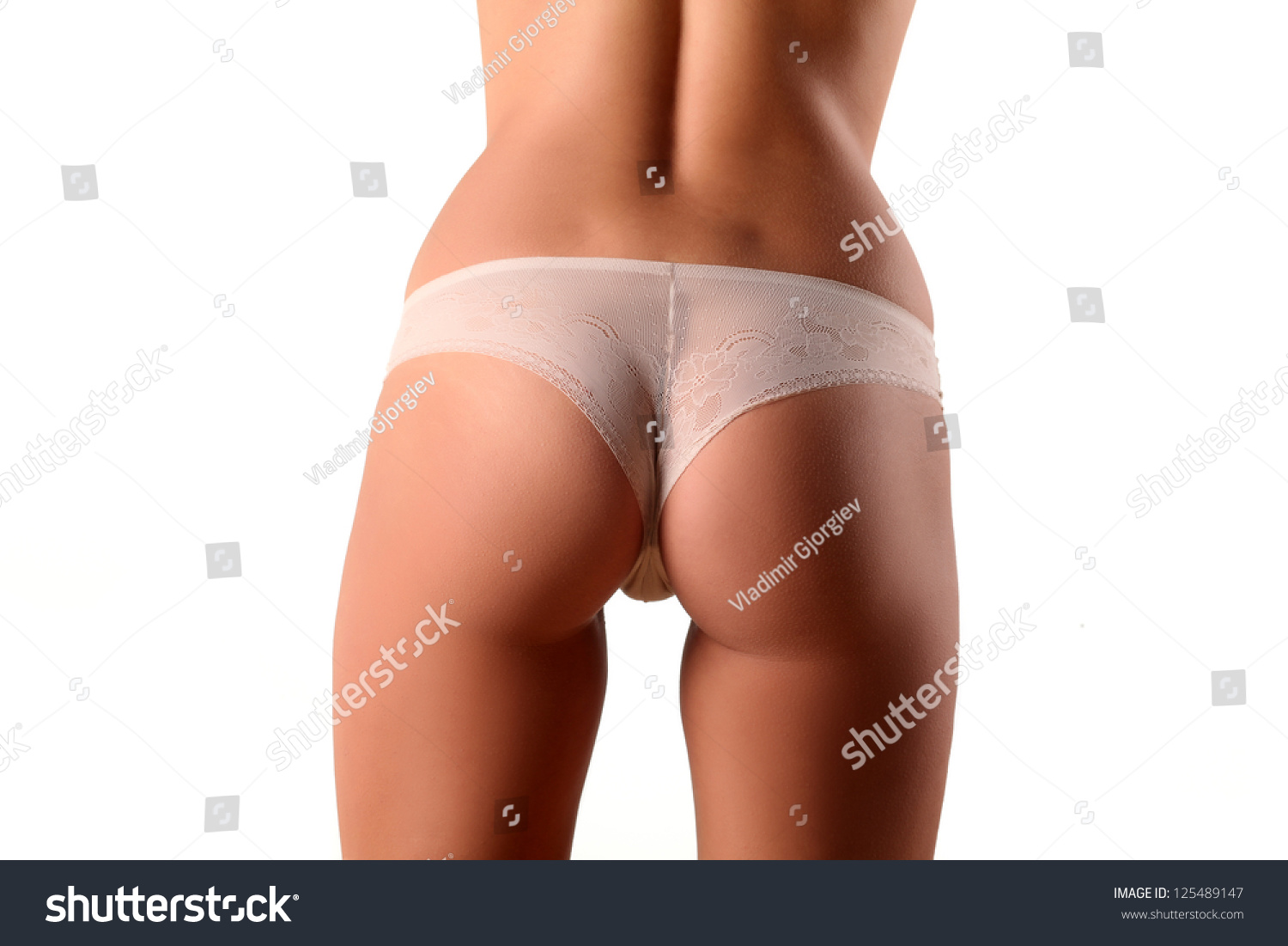 A beautiful white ass in white thong panties