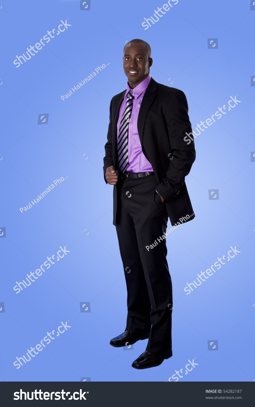 black suit with plum shirt