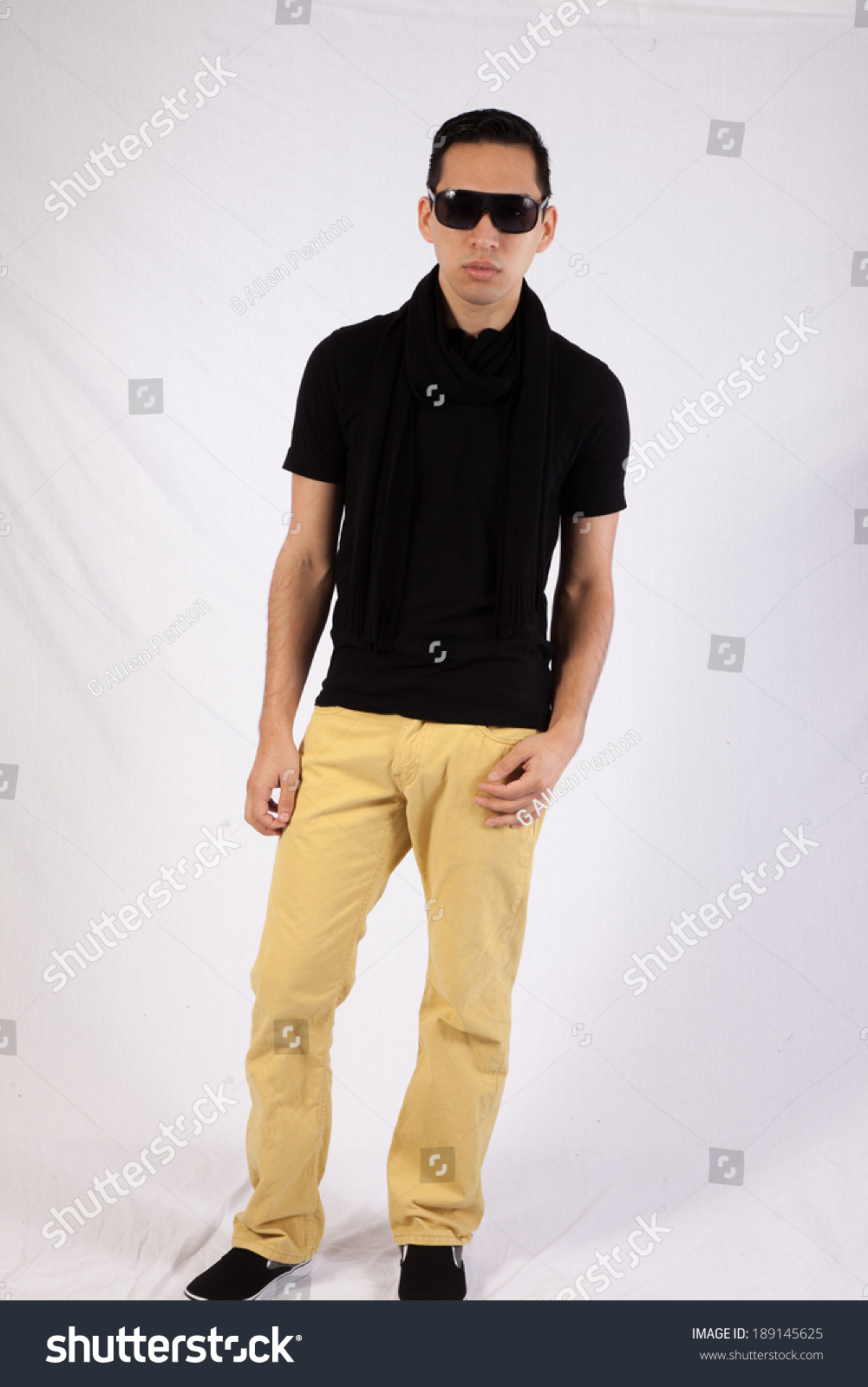 yellow pants black shirt