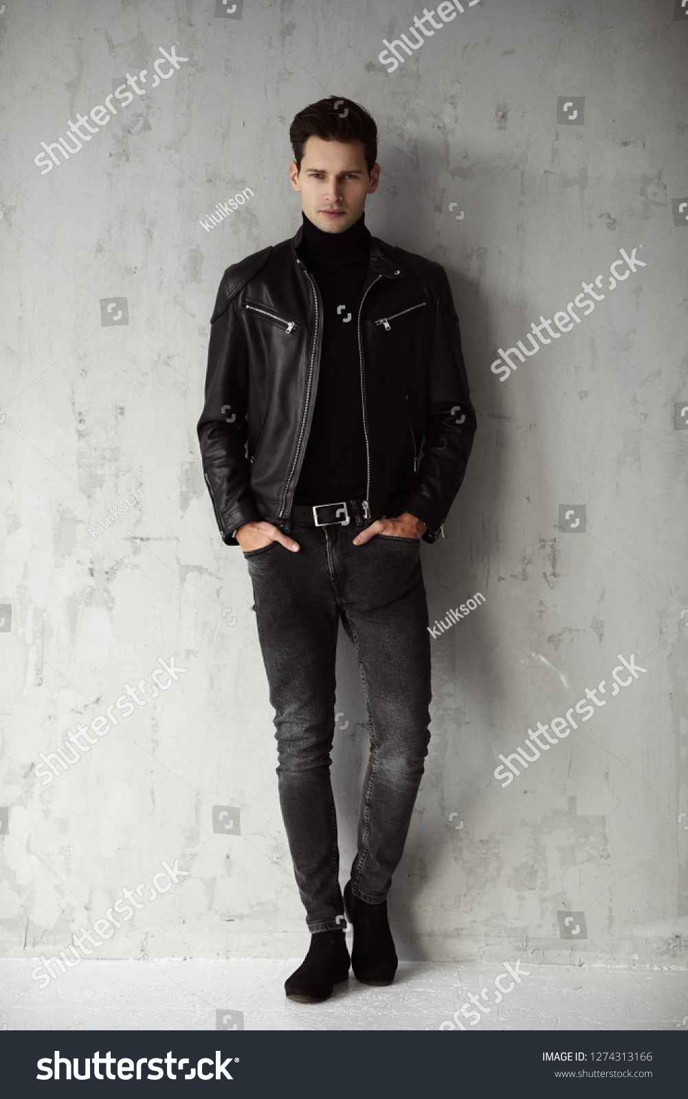 man in black outfit