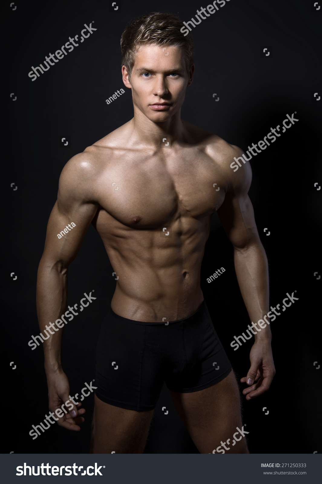 Handsome Muscular Young Bodybuilder Showing His Stock Photo 271250333 ...