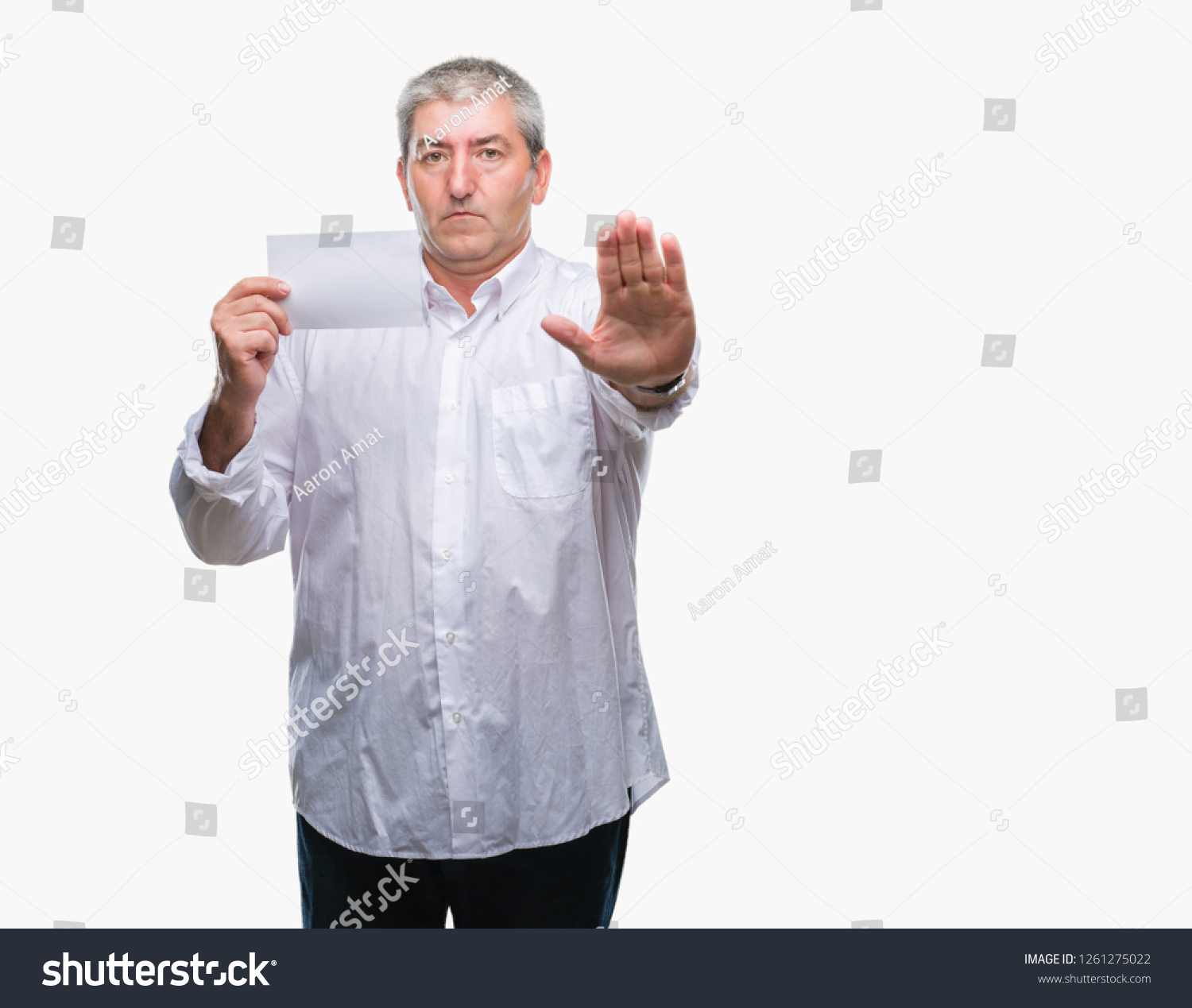 handsome senior man holding blank card stock photo (edit now