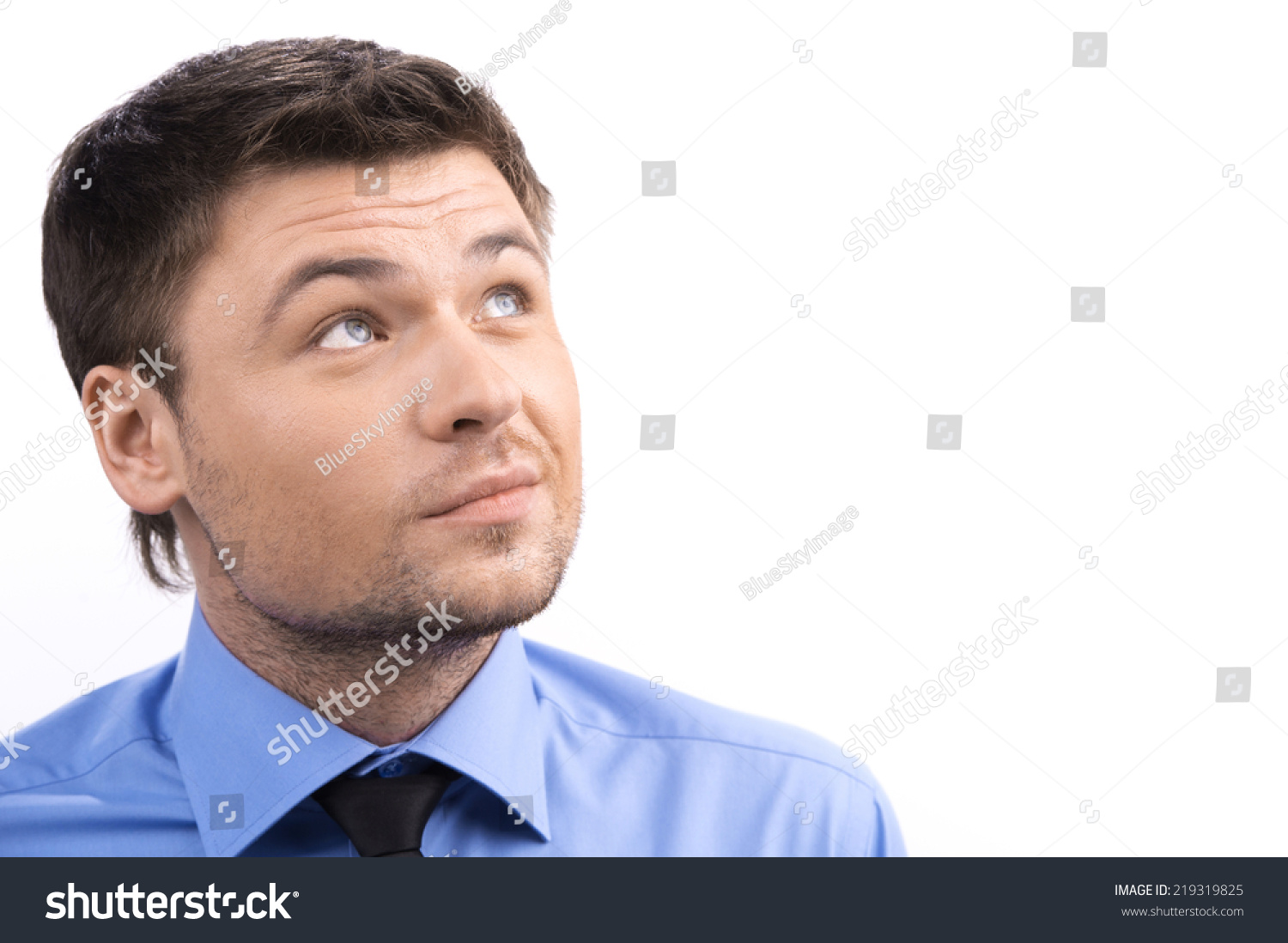 Handsome Smiling Young Man Looking Over Stock Photo (Edit Now) 219319825